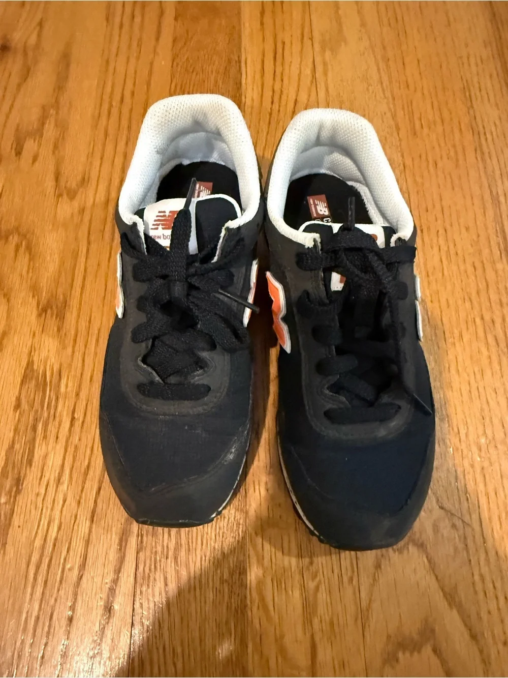 New Balance Kids Black and Orange Low-Top Sneakers